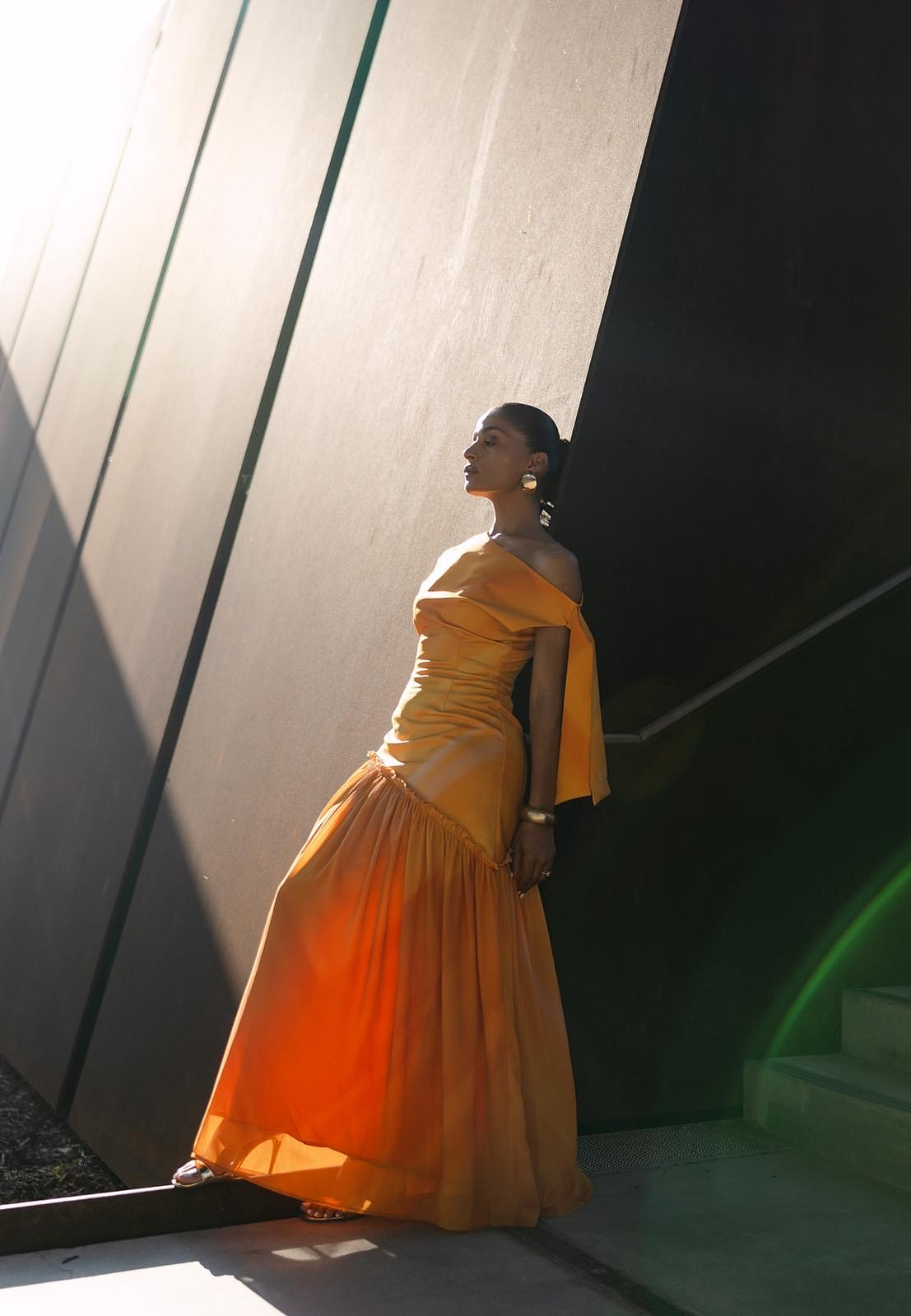 Canadian designer gown in vivid orange